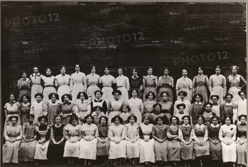 Group photo of women and girl workers at Mackintosh, Halifax, West Yorkshire, 1912. Artist: Unknown