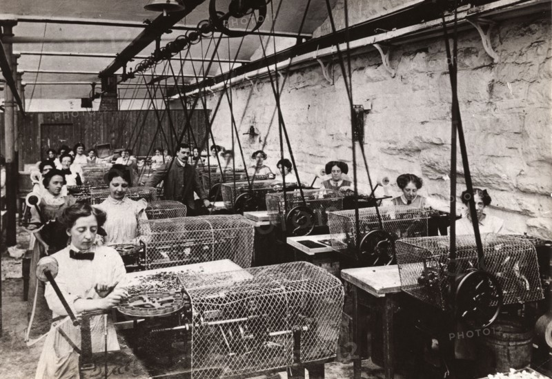 Toffee wrapping machines, Mackintosh factory, Halifax, West Yorkshire, 1912. Artist: Unknown