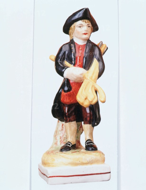 Staffordshire golfing figure, c1900. Artist: Unknown