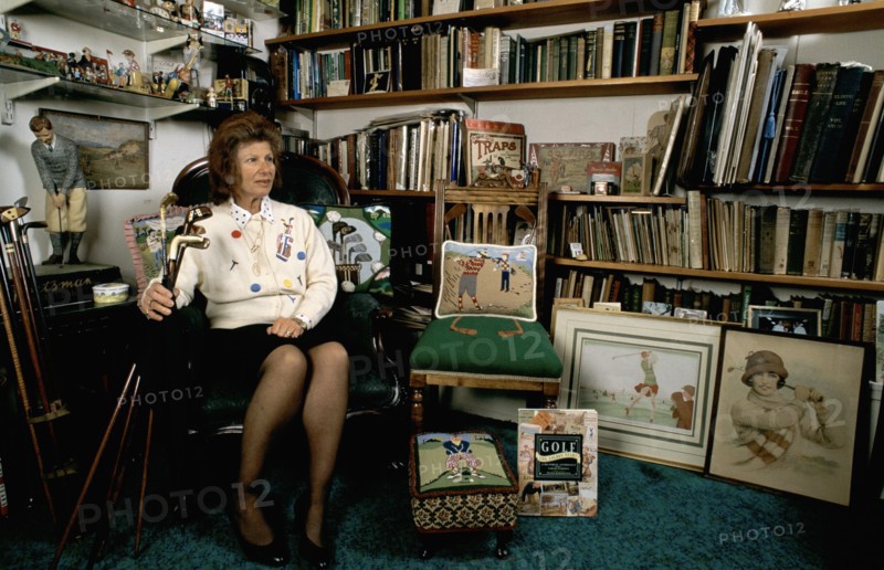 Author Sarah Fabian Baddiel at home with some of her golfing collection. Artist: Unknown