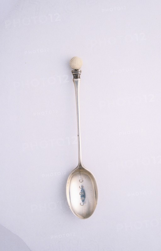 Silver spoon with golf ball motif, c1910. Artist: Unknown