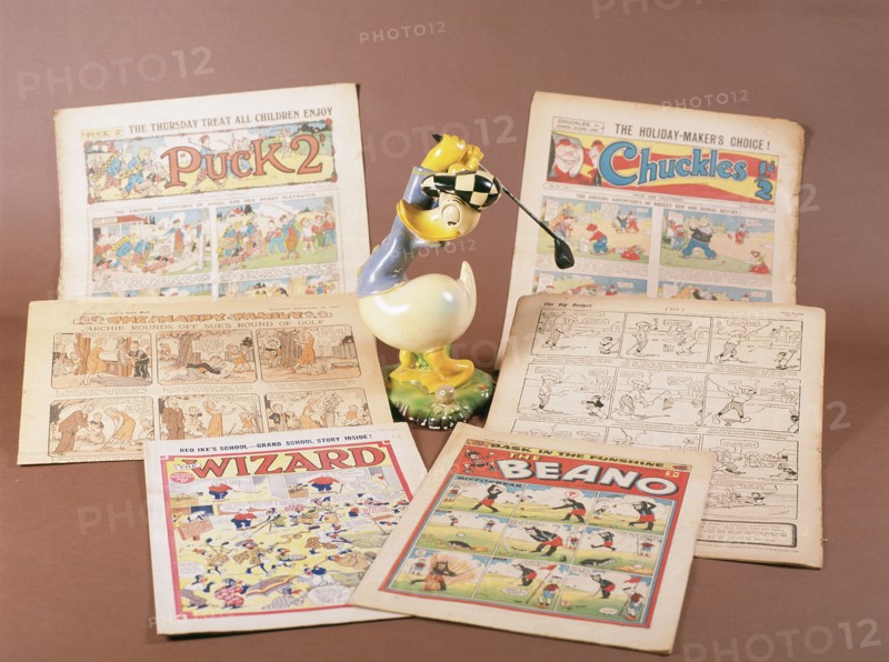 Children's comics with golfing theme, and Donald Duck figurine, c1950s-1960s. Artist: Unknown