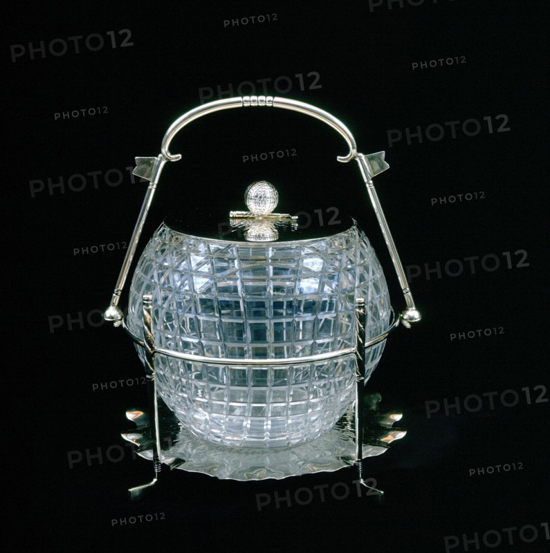 American glass biscuit barrel cut in the shape of a mesh patterned golf ball, 1910. Artist: Unknown