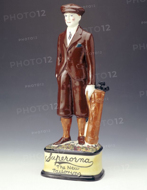 Pottery figure of a golfer advertising Superorna tailoring, 1920s. Artist: Unknown
