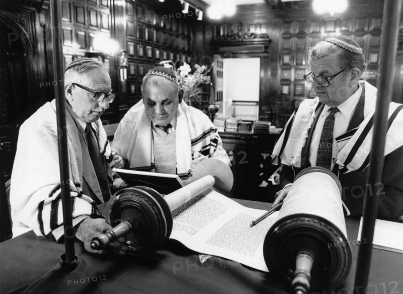Rabbis looking at scrolls. Artist: Unknown