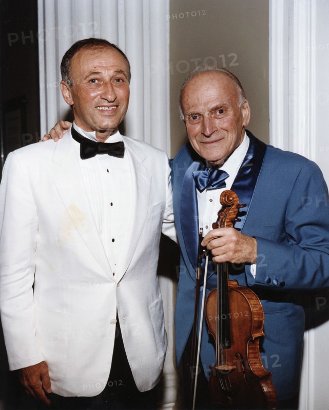 Yehudi Menuhin, American violinist, and Dov Seltzer, Romanian composer, 1992. Artist: Sidney Harris
