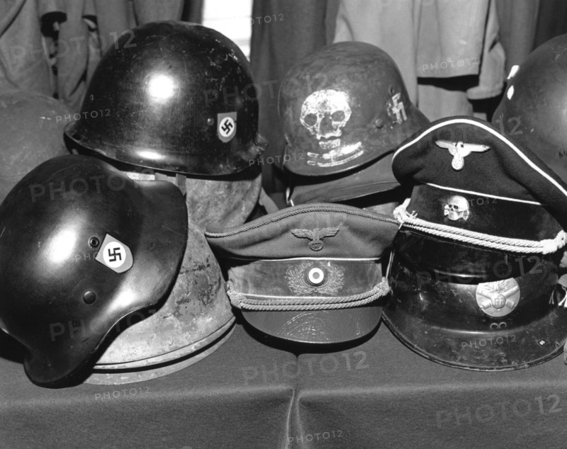 Auction of Hitler's hat at Phillips, London, c1980s? Artist: Sidney Harris