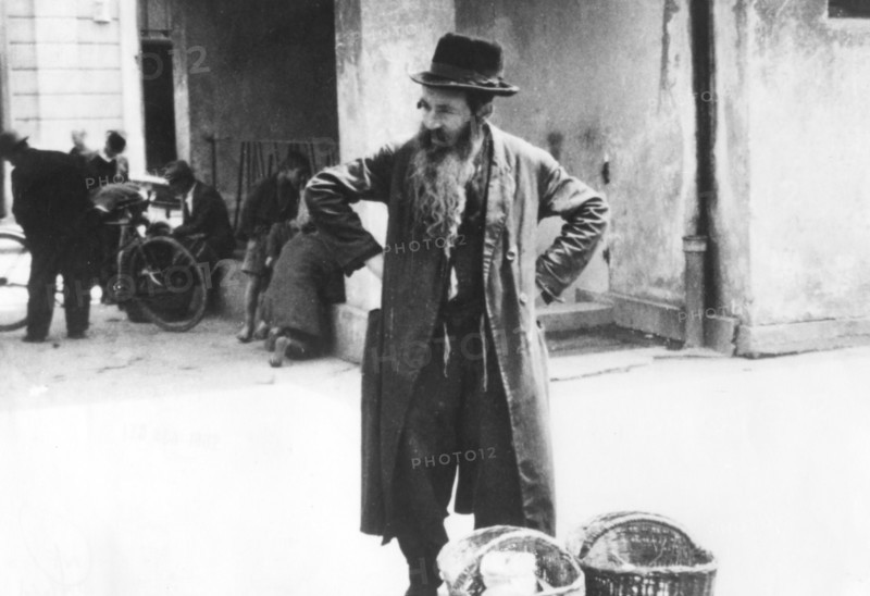 Jewish peddler selling potatoes, Warsaw Ghetto, Poland, World War II, 1940-1945. Artist: Unknown