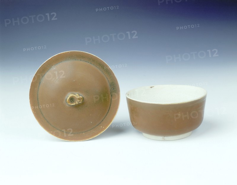 Ding persimmon red glazed covered bowl with white glazed interior, Jin dynasty, China, 12th century. Artist: Unknown