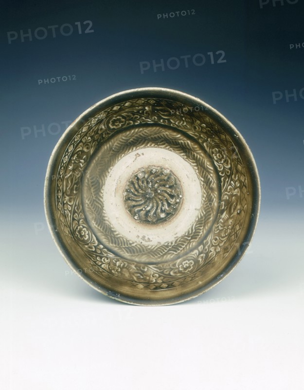 Stoneware bowl with moulded peony scroll and lions, Jin dynasty, China, 13th century. Artist: Unknown