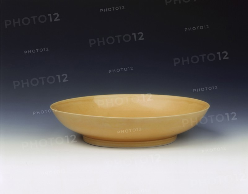 Imperial yellow glazed saucer, Yongzheng period, Qing dynasty, China, 1723-1735. Artist: Unknown