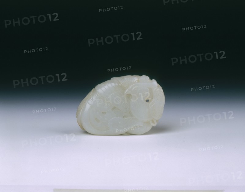 'Mutton fat' jade pendant of a phoenix and peaches, Qing dynasty, China, probably 18th century. Artist: Unknown