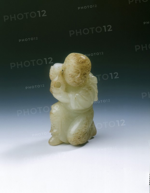 Yellowish jade kneeling tribute bearer, Tang or Liao dynasty, China, 8th-11th century. Artist: Unknown