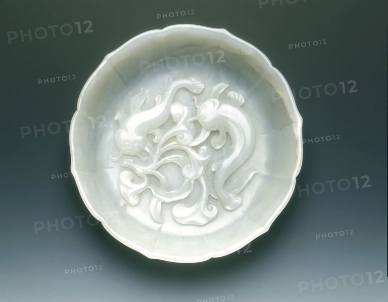 White jade bracketed saucer with two catfish and fungus in relief, Qing dynasty, mid 18th century. Artist: Unknown