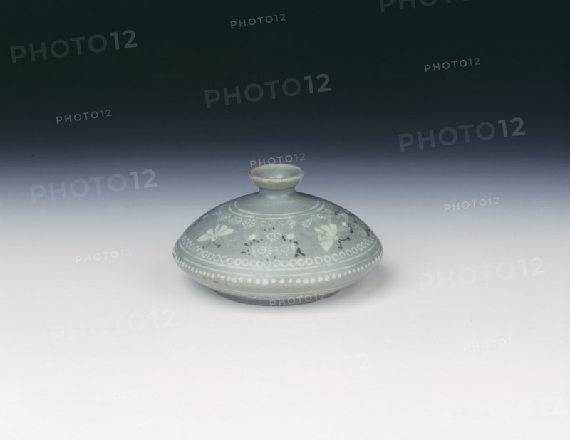 Celadon oil jar with inlaid design of moths and daisies, Koryo dynasty, Korea, late 12th century. Artist: Unknown