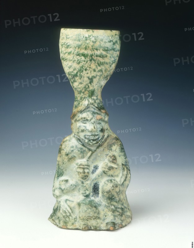 Candlestick of a human figure with infant, Eastern Han dynasty, 25 AD-220 AD. Artist: Unknown