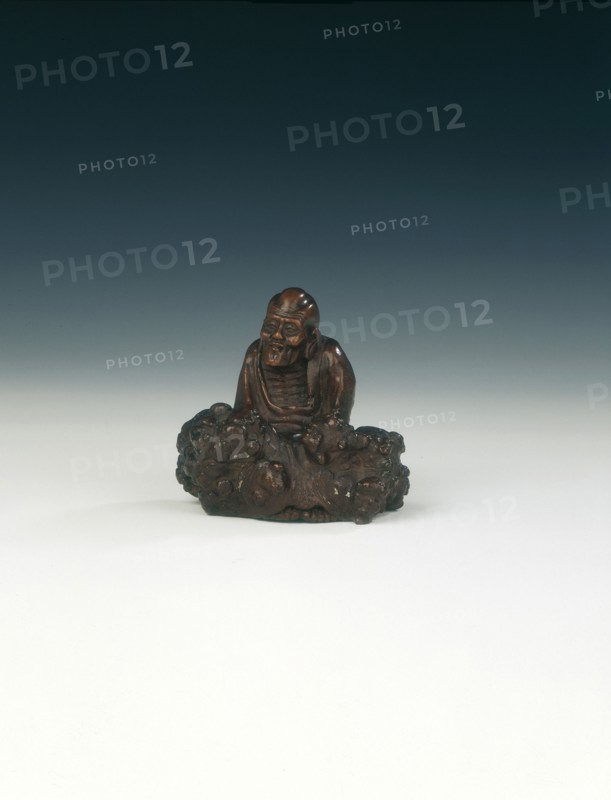 Wood carving of luohan and rock, Qing dynasty, China, 1644-1911. Artist: Unknown