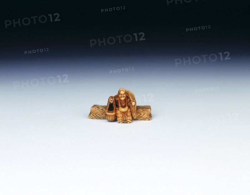 Ivory netsuke of the poet Ono No-Komachi as an old hag, Japan, 19th century. Artist: Unknown