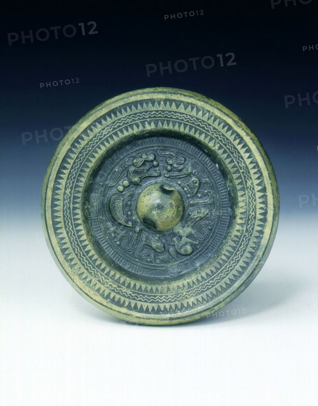 Bronze mirror with two dragons, Han dynasty, China, 206 BC-220 AD. Artist: Unknown