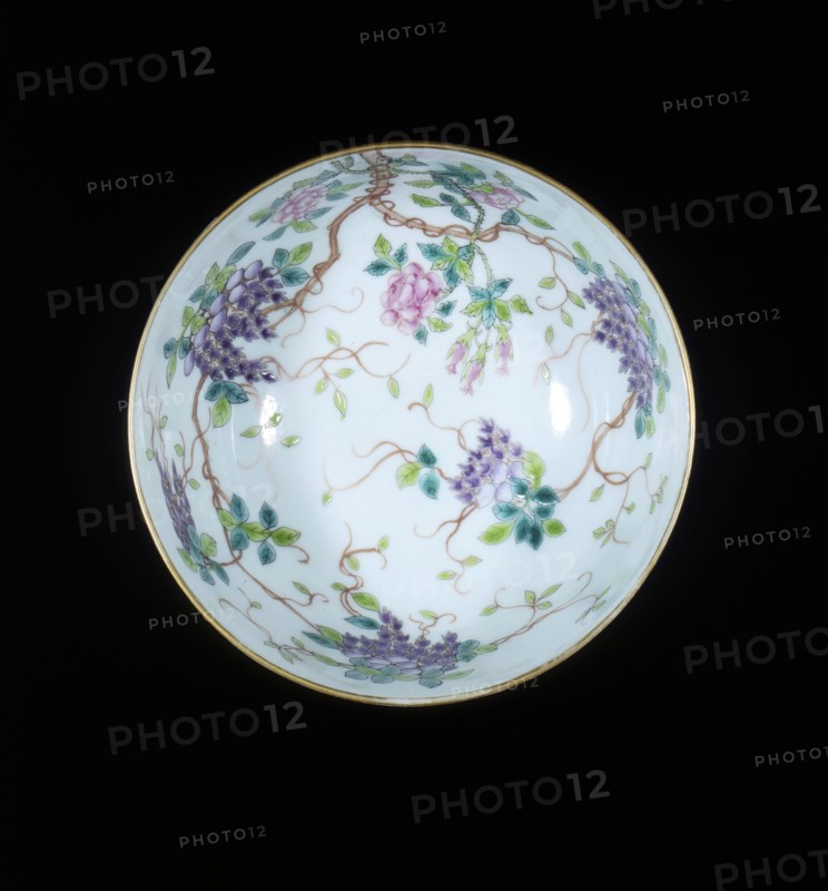 Bowl with ribboned swastikas above waves, Guangxu period, Qing dynasty, China, c1900. Artist: Unknown