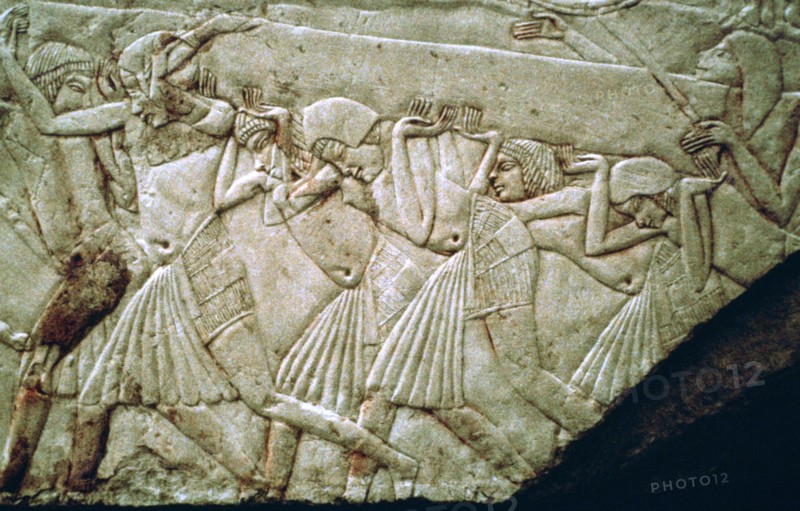 Egyptian relief of men moving a stone lintel. Artist: Unknown