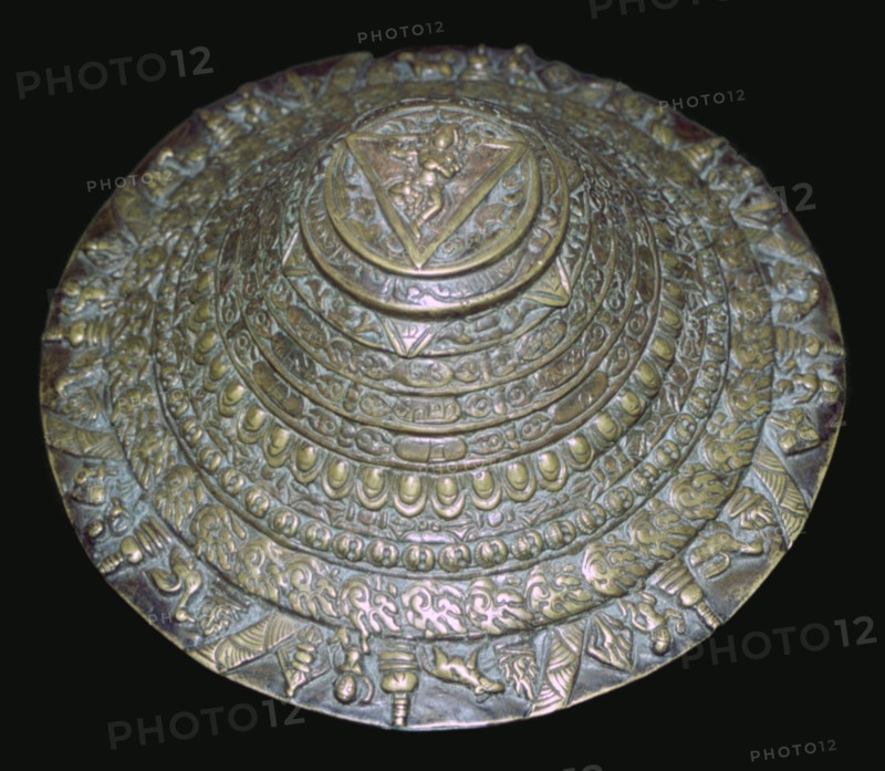 Circular plaque from Nepal with dancing figure, probably Chamunda. Artist: Unknown
