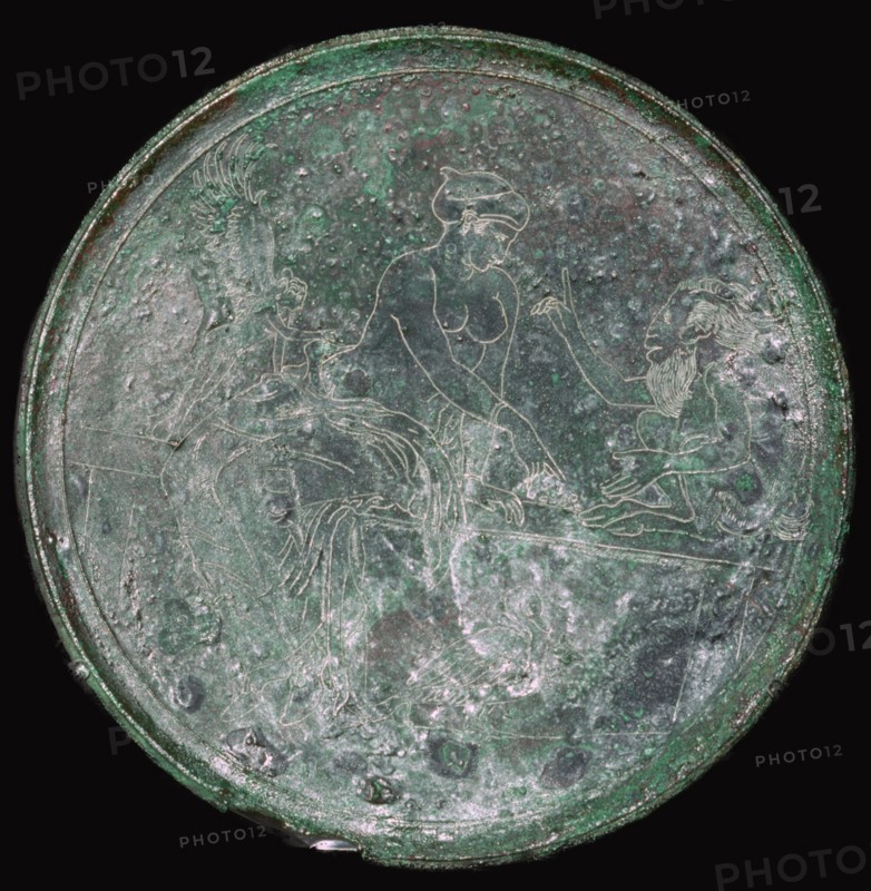 Greek bronze mirror case with Aphrodite and Pan, c350 BC. Artist: Unknown
