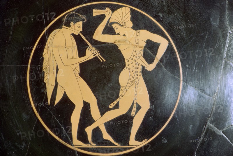 Vase-painting of a youth playing the flute and a woman dancing, 6th century BC. Artist: Epikektos