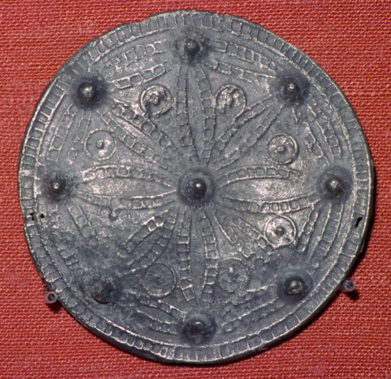 Cast lead-alloy disc brooch. Artist: Unknown