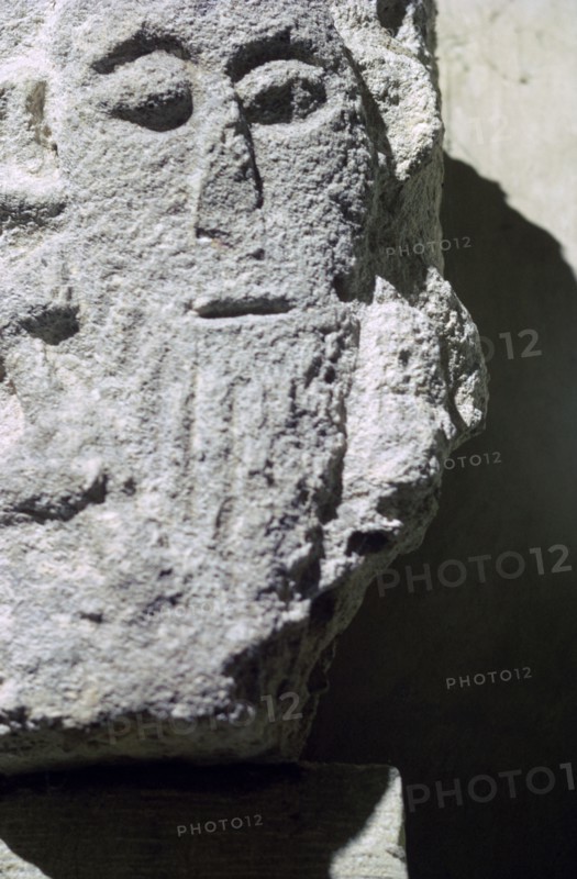 Detail of a stone head in Penmon Priory. Artist: Unknown