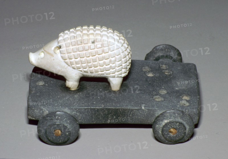 Persian hedgehog mounted on a wheeled carriage. Artist: Unknown