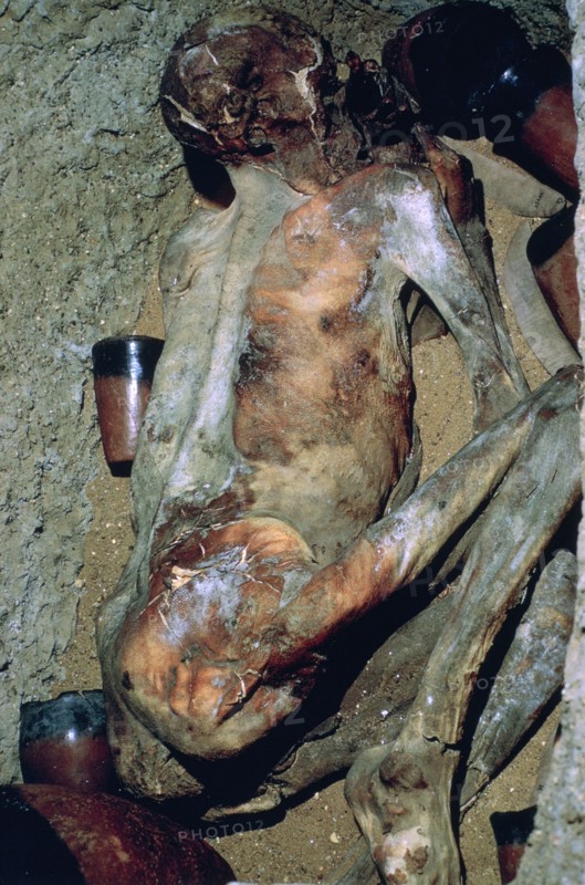 Early Egyptian burial known as 'Ginger'. Artist: Unknown