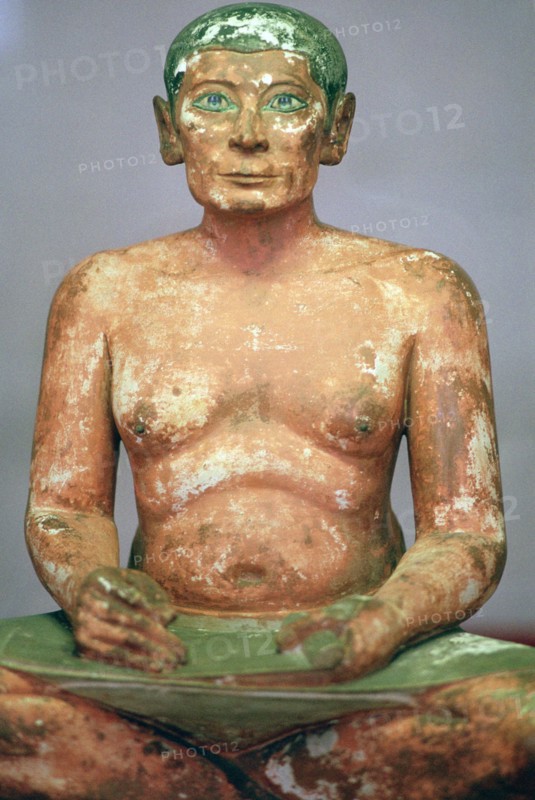 Egyptian seated scribe model. Artist: Unknown