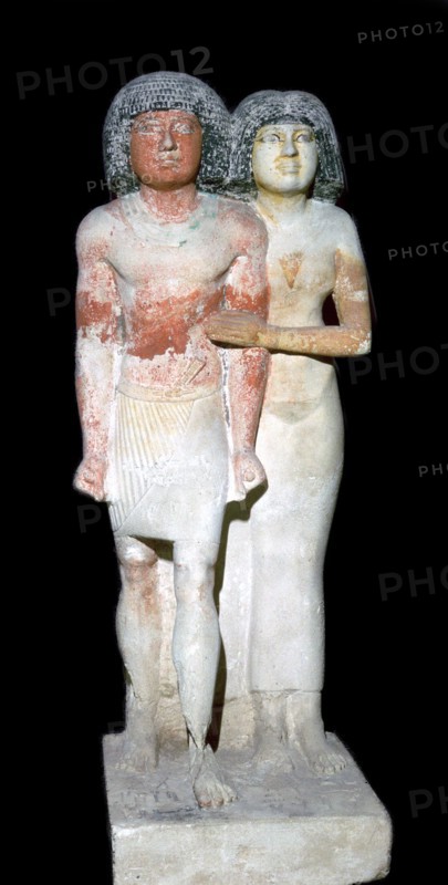 Egyptian sculpture of a man and his wife. Artist: Unknown
