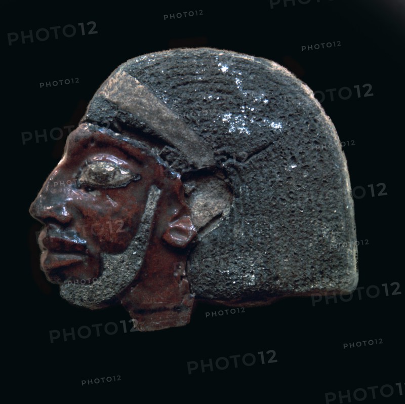 Egyptian glazed relief of a Nubian slave. Artist: Unknown