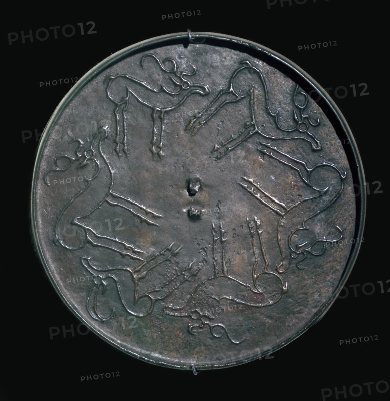 Back of an early Russian bronze mirror. Artist: Unknown