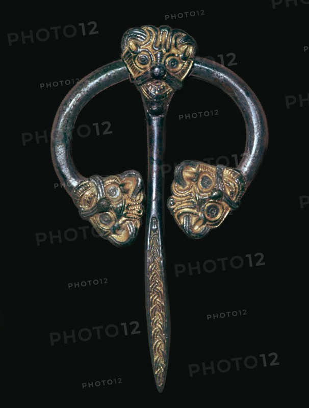 Viking gilded bronze dress fastener, 9th century. Artist: Unknown