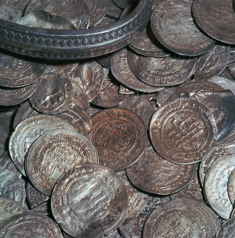 Hoard of silver with arab coins from a Viking grave. Artist: Unknown