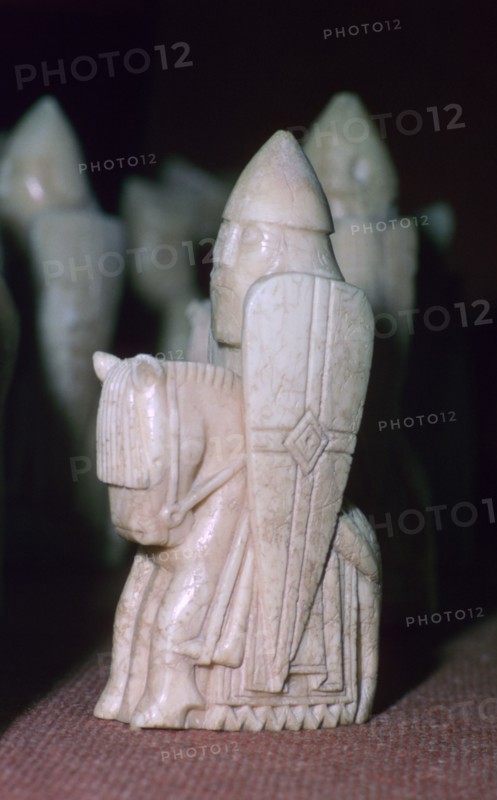 A Knight - The Lewis Chessmen, (Norwegian?), c1150-c1200. Artist: Unknown