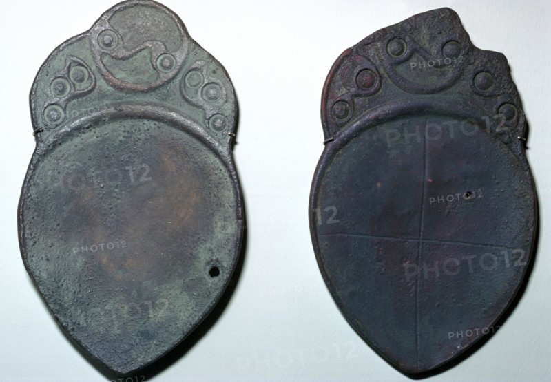 Pair of bronze ritual iron age spoons. Artist: Unknown