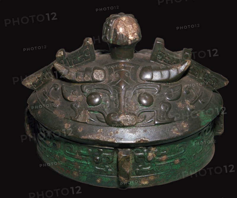 Chinese bronze lid of a wine-vessel, 11th century BC.h Artist: Unknown