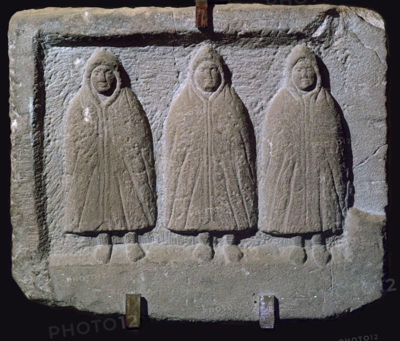 Stone relief of a trio of hooded Romano-British deities, 3rd century. Artist: Unknown