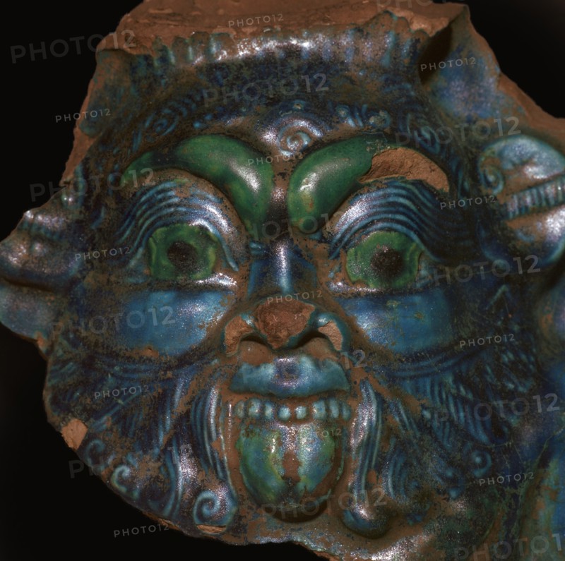Egyptian faience head of Bes. Artist: Unknown
