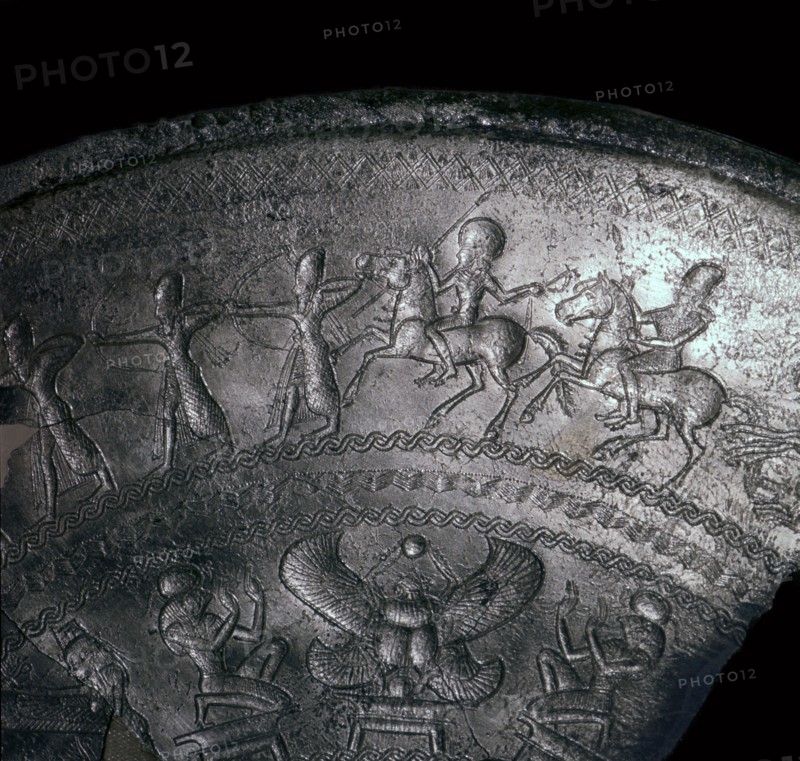 Detail of a Phoenician silver bowl showing soldiers attacking a city, 7th century BC. Artist: Unknown