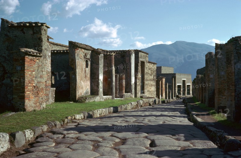 Street scene in Pompeii with Vesuvius in the background, 1st century. Creator: Unknown.
