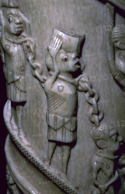 Detail of an ivory horn showing slaves in chains Artist: Unknown