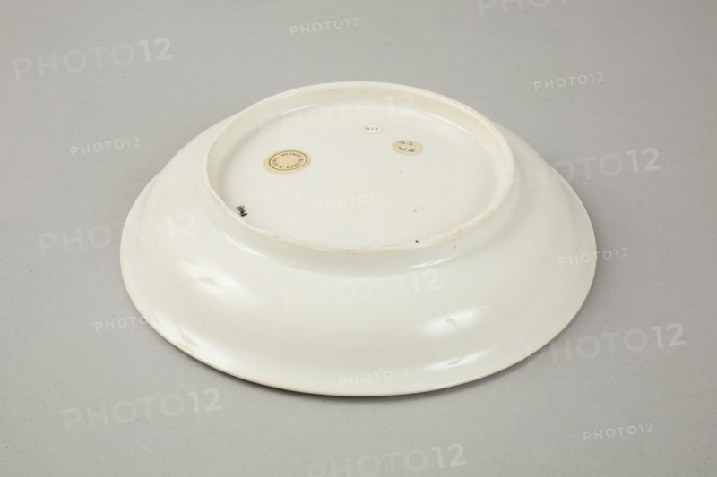 White dish with anhua design of two phoenix and cloud scroll design, Song dynasty, c.1300. Artist: Unknown.