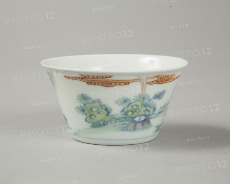 Doucai flared cup with two figures in a landscape, late Kangxi period (1700-1722). Artist: Unknown.