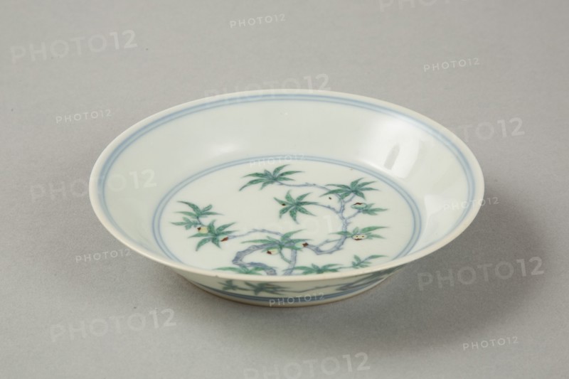 Doucai saucer with fruiting peach, late Kangxi period (1700-1722). Artist: Unknown.