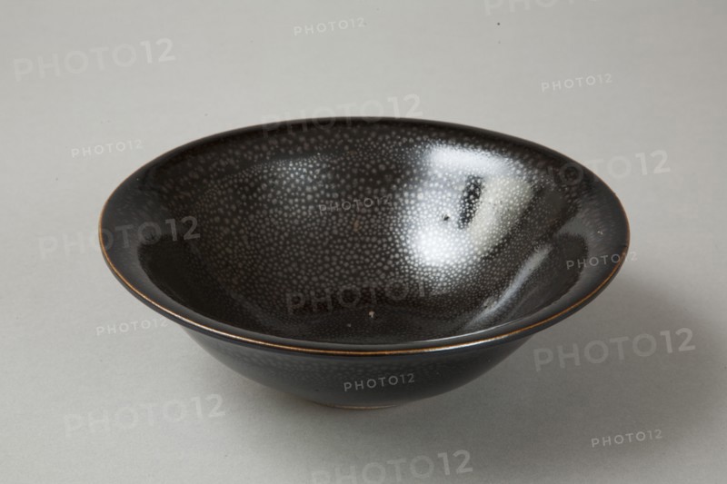 A 20th century copy of buff-bodied Cizhou-type bowl with oil spot glaze, 20th century. Artist: Unknown.
